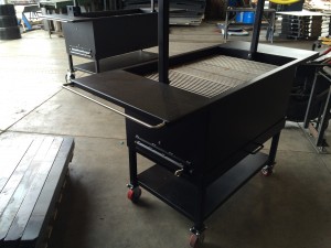 XXL Cattleman's BBQ Grill showing 5-11-1/4" Stainless Steel Grilling Sections - Back Side near BBQ Ashtray